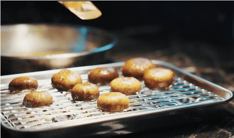 Sautéed mushrooms on a wire rack